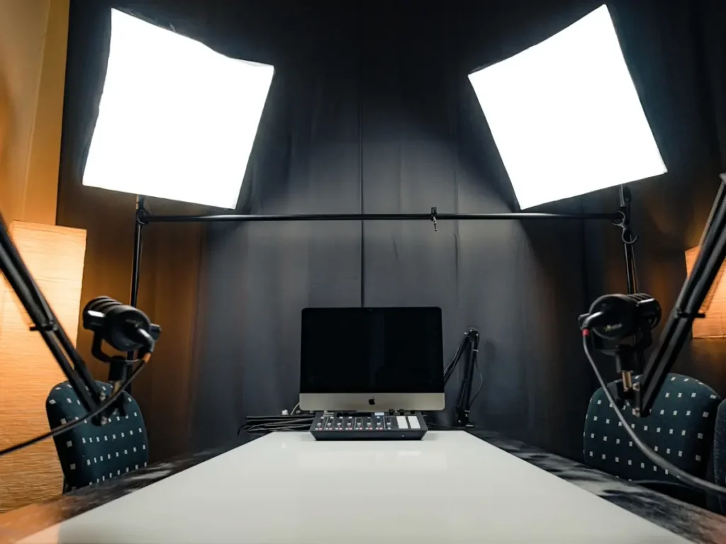 Professional podcast recording session in a West Palm Beach office.